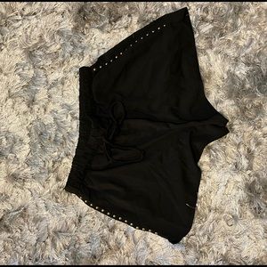 black jaw string studded shorts